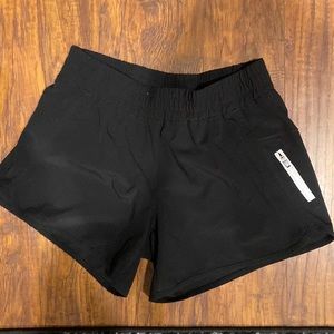 ZYIA black shorts, built in liner, side pocket